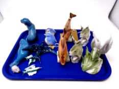 A tray containing Bluebird cruet set, Poole figures of seals,