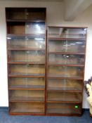 Two 20th century Simplex stacking bookcases with sliding glass doors,