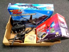 A box containing Air Hogs Dominator remote controlled aircraft together with a further remote