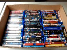 A box containing a large quantity of Blu Ray movies and box sets