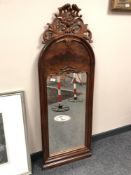 A 19th century mahogany mirror,