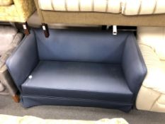 A 20th century two seater settee upholstered in a blue fabric