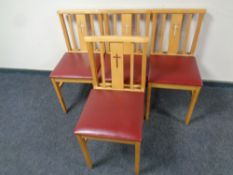 A set of four 20th century chapel chairs
