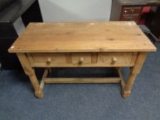 A reclaimed pine kitchen prep table fitted three drawers
