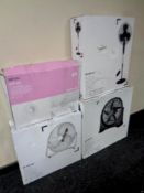 Four boxed electric fans,