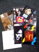 A collection of music memorabilia to include Elvis calendars and CD,