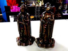 Two lustre cast iron Knight companion stands