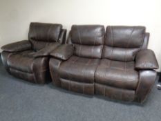 A two seater settee with matching electric armchair upholstered in a brown leather-like fabric