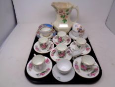 A tray containing assorted ceramics to include Ringtons Maling jug,