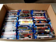 A box containing a large quantity of Blu Ray movies