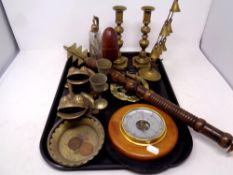 A tray containing assorted brass ware to include candlesticks,