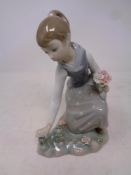 A Lladro figure, Girl picking flowers, No.
