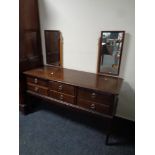 A Stag Minstrel six drawer dressing table (missing central mirror)