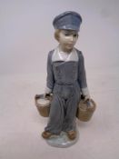 A Lladro figure, Dutch boy with pails, No.