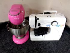 A Kenwood Patissier food mixer (pink) together with a Lervia electric sewing machine