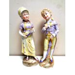 A pair of antique continental bisque figures,