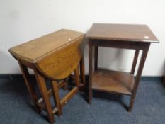 An oak gate leg table together with a two tier occasional table
