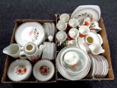 Two boxes containing a large quantity of J and G Meakin studio pottery poppy patterned dinner and