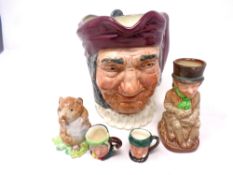 A large Royal Doulton character jug, Simon Cellarer, together with two tiny character jugs,