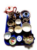 A tray containing a quantity of antique oriental wares to include teapot, tea bowls,