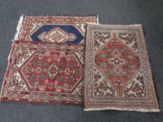 Three fringed Persian prayer rugs