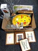 A box containing framed prints, tapestries, unframed maps, serving dish, glassware,