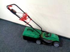 A Qualcast electric lawn mower with lead