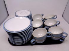 A tray containing twelve Denby Colonial Blue trios