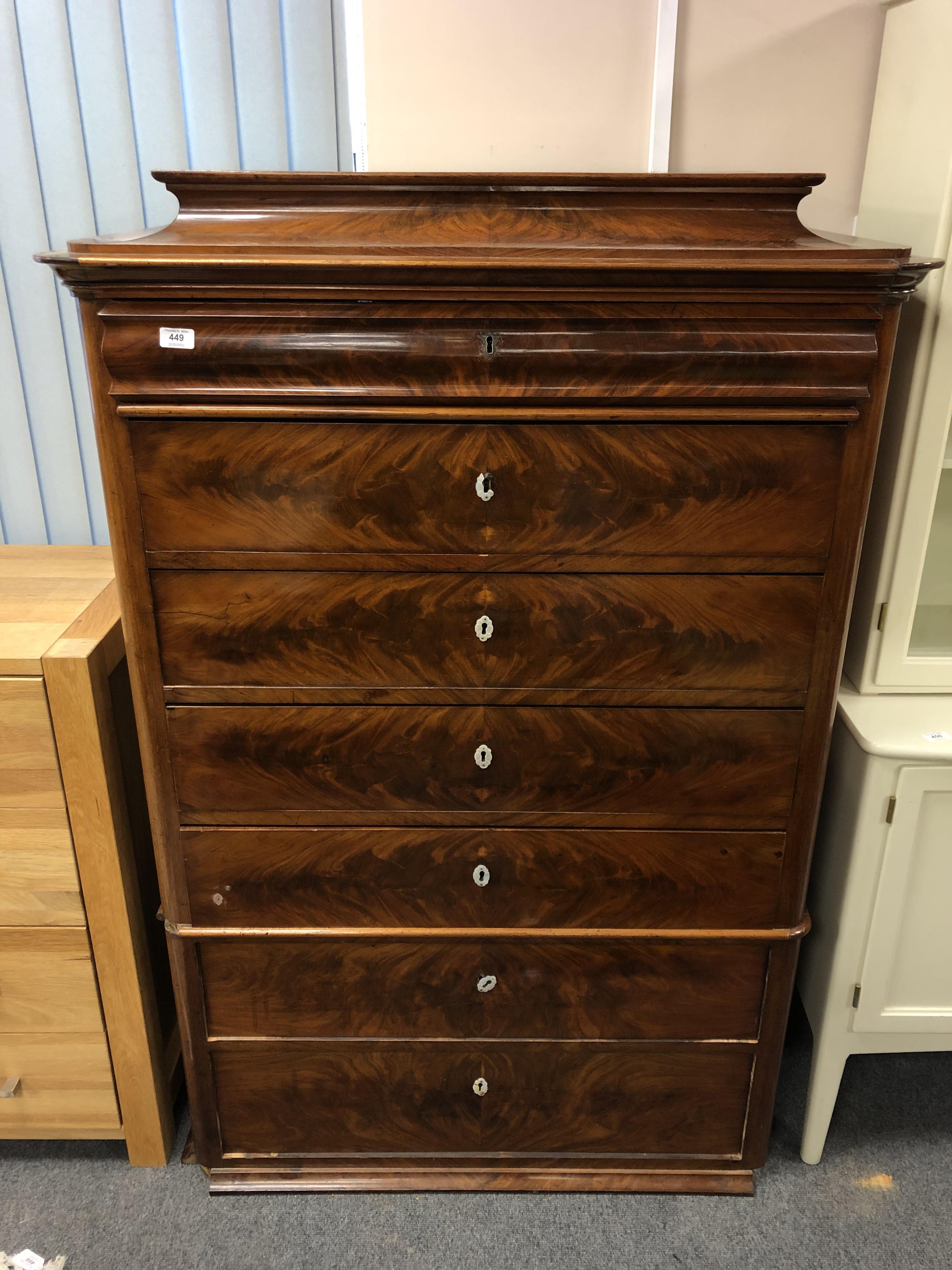 A 19th century mahogany seven drawer chest,
