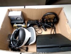 A box containing Sony Play Station 4 with controllers, Sony VR headset,