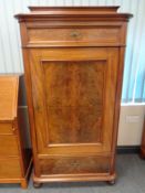 A 19th century mahogany sentry door cabinet fitted two drawers on bun feet,