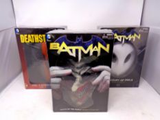 A DC Comics Batman Death of the Family book and mask set,