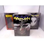 A DC Comics Batman Death of the Family book and mask set,