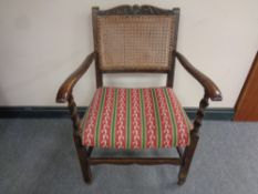 A beech barley twist bergere backed armchair