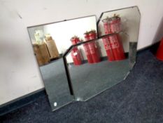 Three frameless mirrors mounted on boards