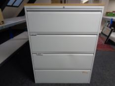 A four drawer metal document cabinet