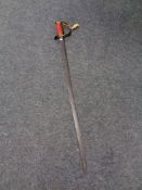 An antique brass handled sword