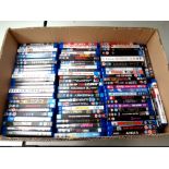 A box containing a large quantity of Blu Ray movies and box sets