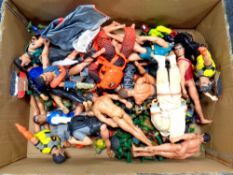 A box containing a large quantity of Action Men and Teenage Mutant Ninja Turtles figures
