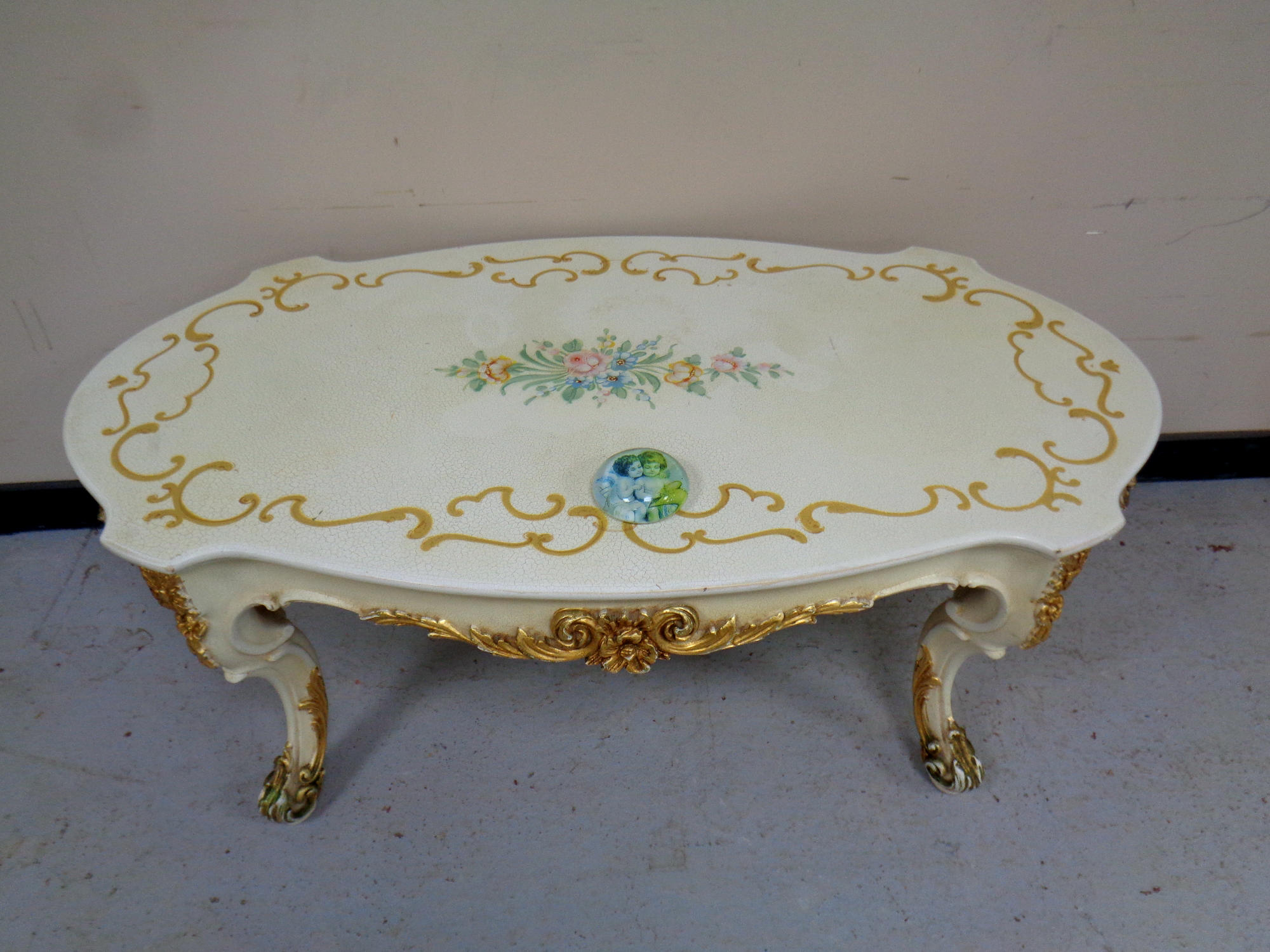 An Italian Silik Baroque-style coffee table,