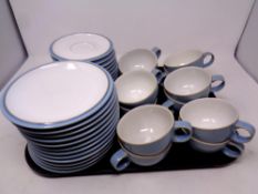 A tray containing twelve Denby Colonial Blue trios