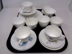 A tray containing a 23 piece Wedgwood ice rose tea service together with three further pieces of