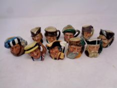 Ten miniature Royal Doulton character jugs to include Robin Hood, The Falconer, Gladiator,