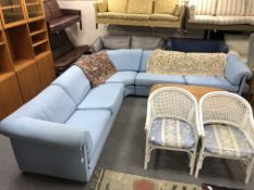 A 20th century blue fabric upholstered corner settee,