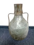 An eastern copper twin handled jug,