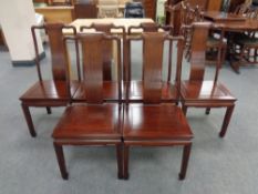 A set of six Chinese style hardwood dining chairs