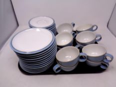 A tray containing twelve Denby Colonial Blue trios