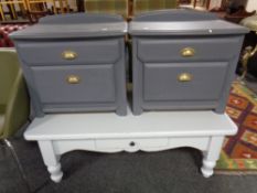 A painted pine rectangular coffee table fitted a drawer together with a pair of painted bedside