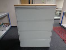 A four drawer metal document cabinet