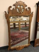 An early 20th century walnut framed Chippendale style mirror,